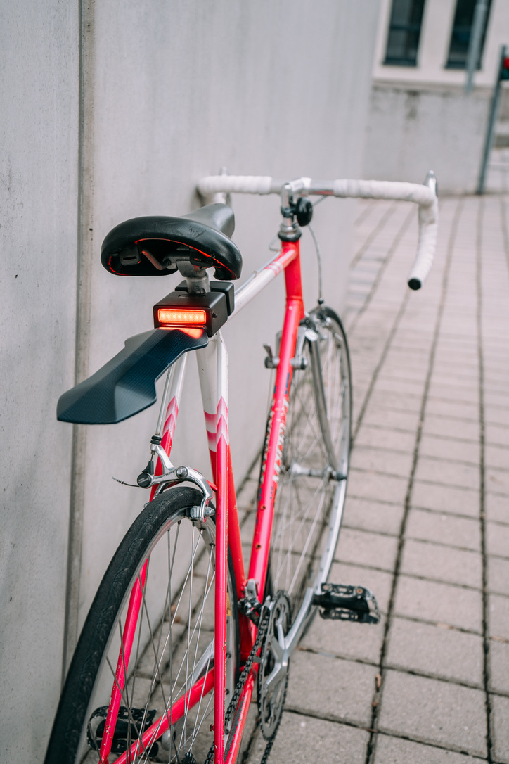 MUC N TUC on red road bike